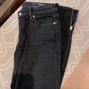 Skinny coated ankle zip jeans